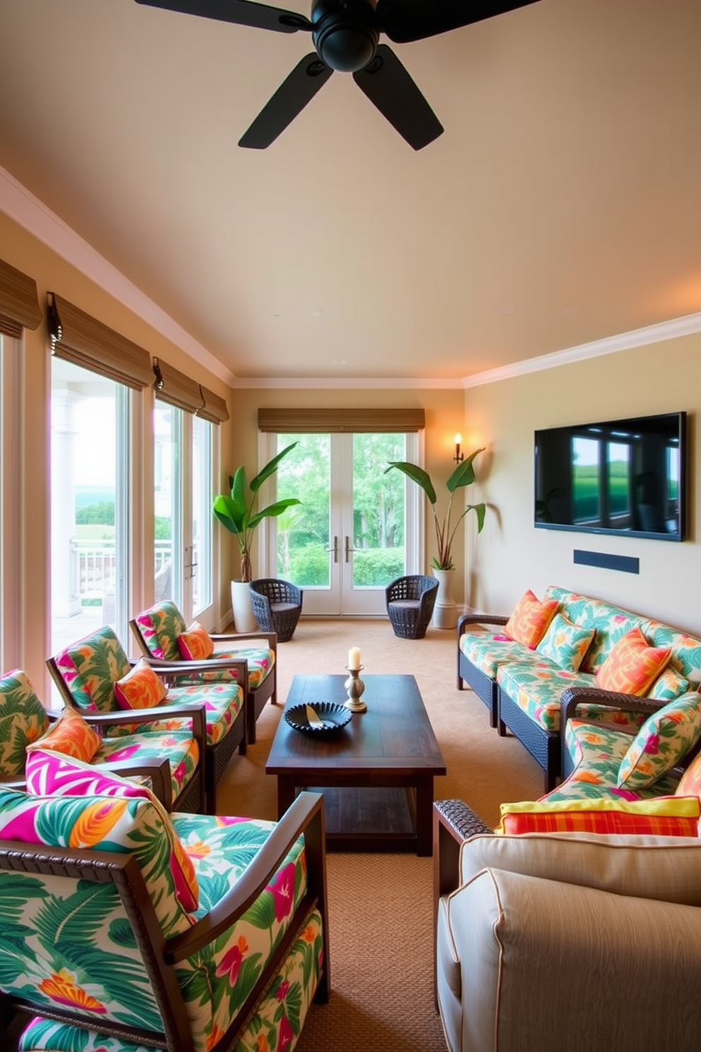 Lounge chairs with vibrant tropical prints are arranged around a low wooden coffee table. The walls are painted in a soft beige, and large windows allow natural light to flood the space, enhancing the relaxed atmosphere. The summer home theater features plush seating with colorful cushions and a large screen mounted on the wall. Decorative elements include palm leaf motifs and ambient lighting that create a cozy yet lively environment.