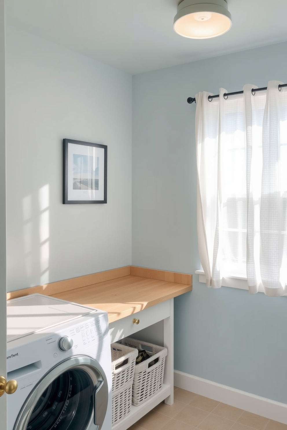 A bright and airy laundry room with a functional folding station. The station features a large countertop made of light wood, with baskets for sorting clothes underneath. The walls are painted in a soft pastel blue, creating a calming atmosphere. Natural light floods the space from a nearby window adorned with sheer white curtains.