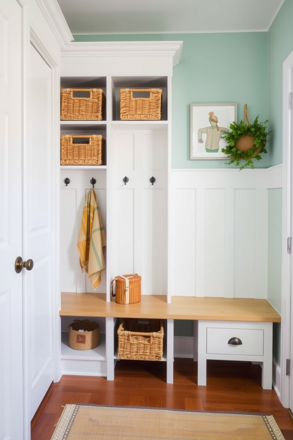 A bright and airy mudroom designed for summer. It features tall storage units with open shelving to maximize vertical space, adorned with woven baskets for organization. The walls are painted in a soft pastel color, complemented by a light wood bench. Fresh greenery and seasonal decor add a welcoming touch, while a durable rug provides comfort underfoot.